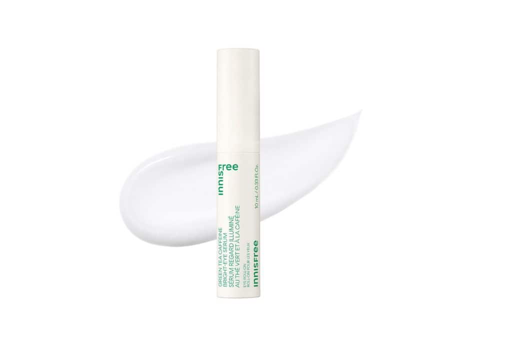A white and green bottle of affordable Korean eye cream.