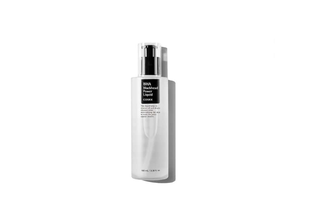 a clear spray bottle with a black label. 