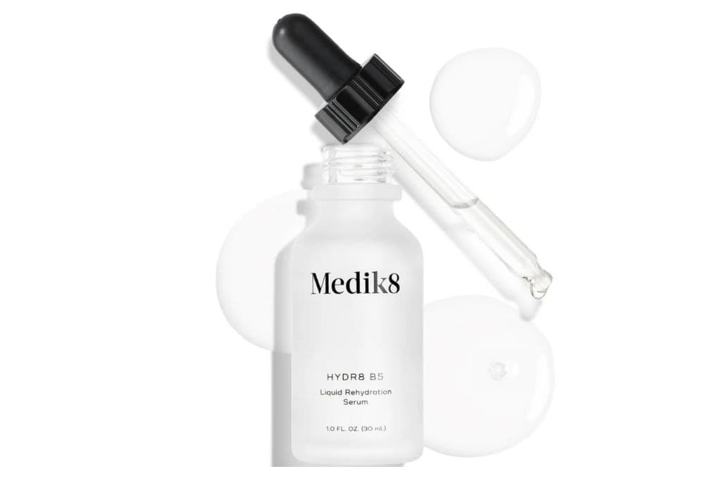 a bottle with a dropper