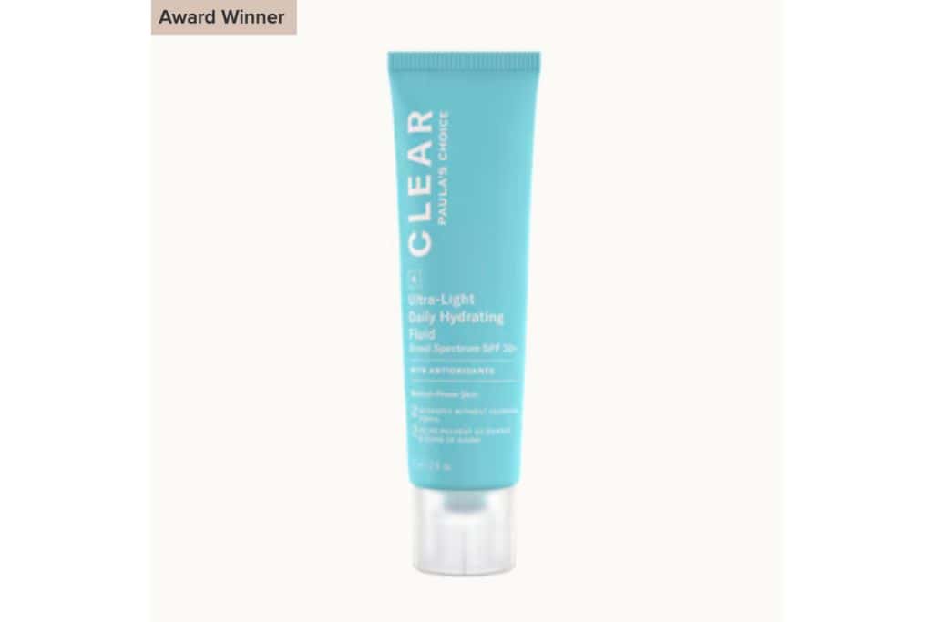 A light blue bottle of sunscreen